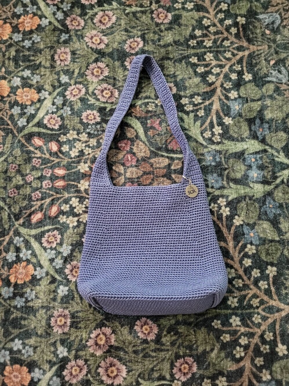 The Sak Lavender Zip-Top Shoulder Bag with Metal Logo Pull